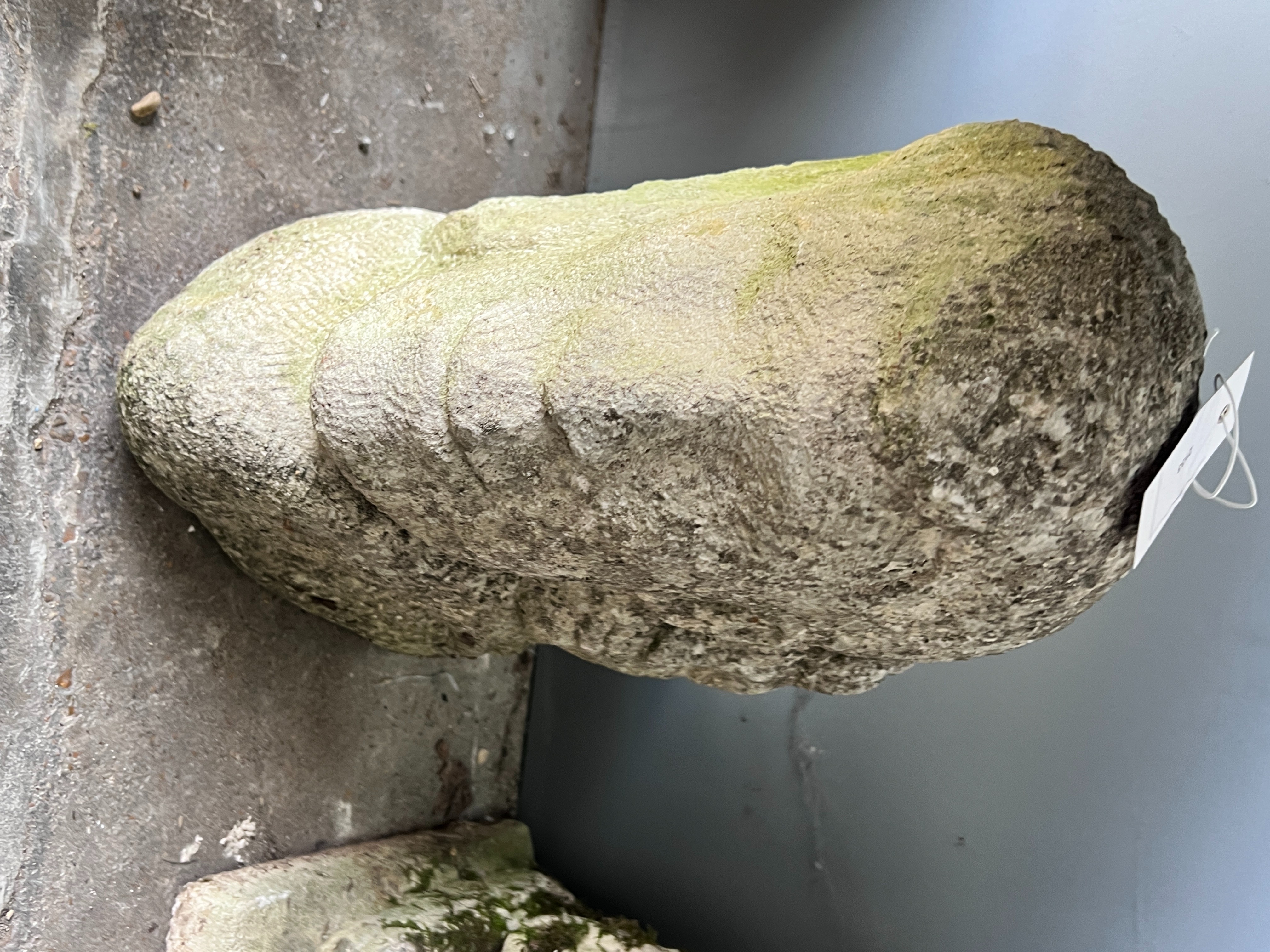 A carved stone corbel, height 40cm